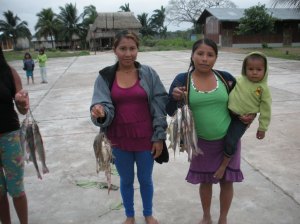 Women with fish to take home to cook